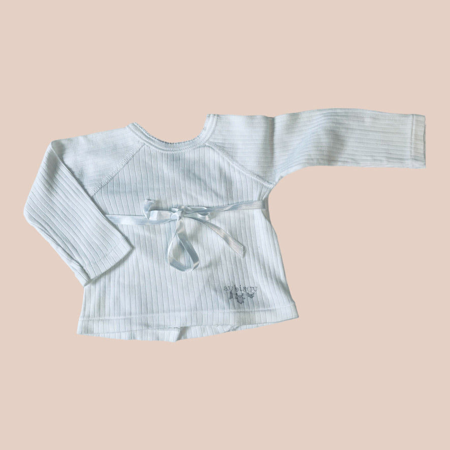 Marque inconnue - 6 mois (petit défaut)