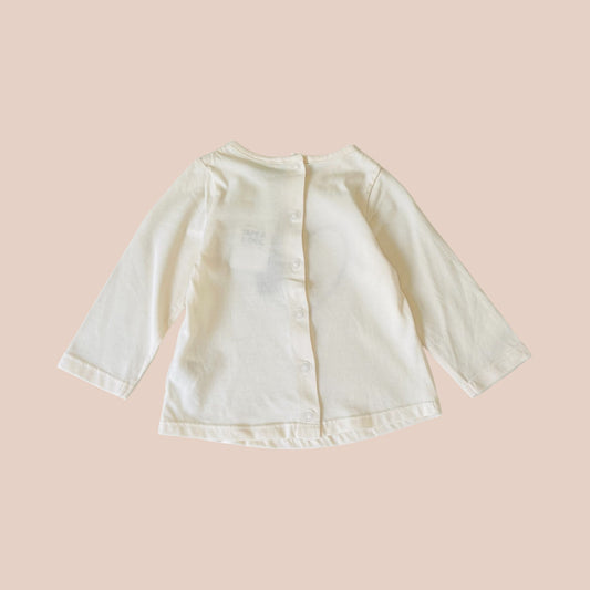 Tape à l'oeil - 9 mois